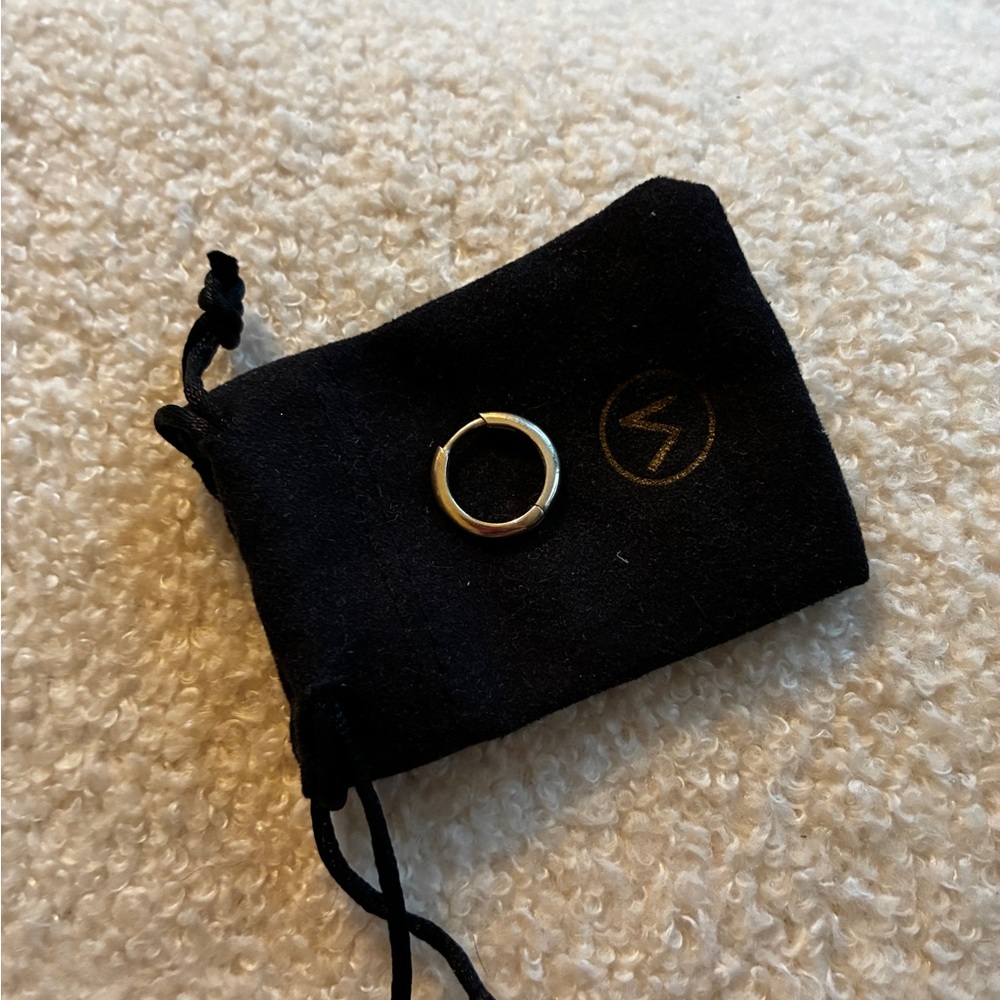 mejuri silver tube huggie hoop - single